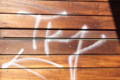 Graffiti Off of Wooden Fences