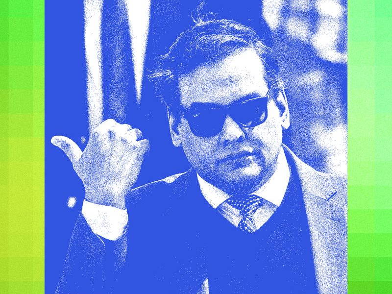 George Santos, former Representative from New York, exits federal court in Central Islip, New York, US, on Friday, April 25, 2025. Former US Representative George Santos, a onetime rising Republican star who falsely claimed to have worked for Goldman Sach