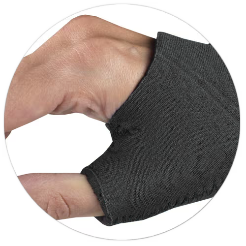CLOSE UP ON HAND WEARING WRIST-THUMB SUPPORT