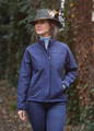 mid layer windproof jacket as part of a warmer attire worn with a roll neck jumper and jeans