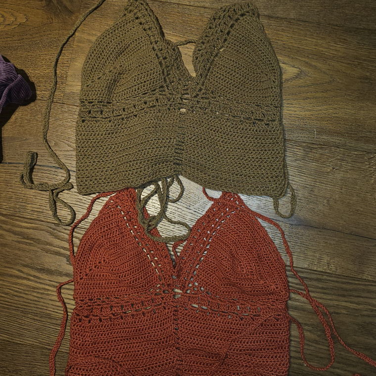 Two identical crochet tops