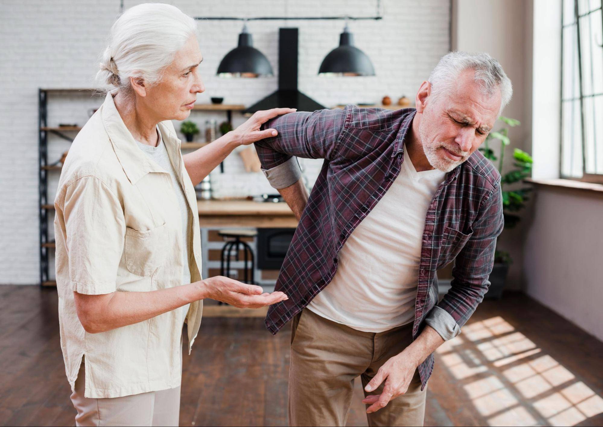 Man experiencing back pain