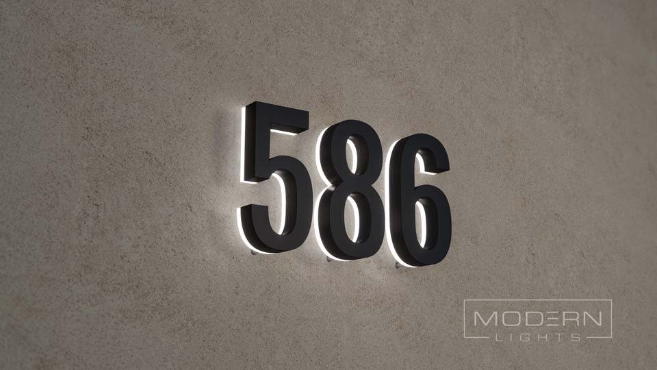 Black letters stucco wall