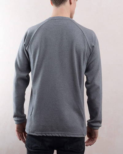 Back of man wearing a plain grey mens organic cotton sweatshirt from organic menswear brand Lyme Terrace