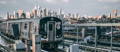 MTA subway and NYC skyline