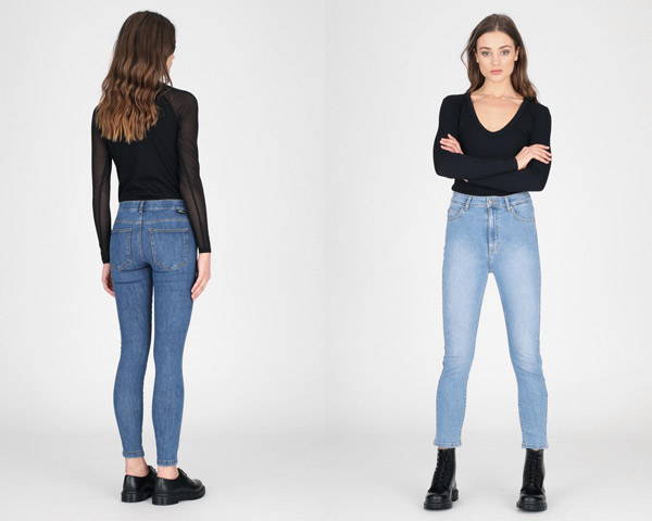 Woman wearing black top with organic cotton sustainable jeans from Dr Denim