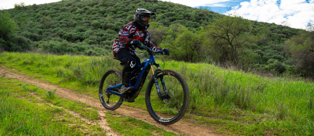 An e-MTB rider on a trail