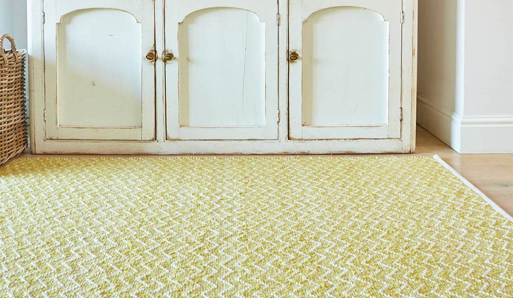 yellow summerhouse rug with cupboard unit