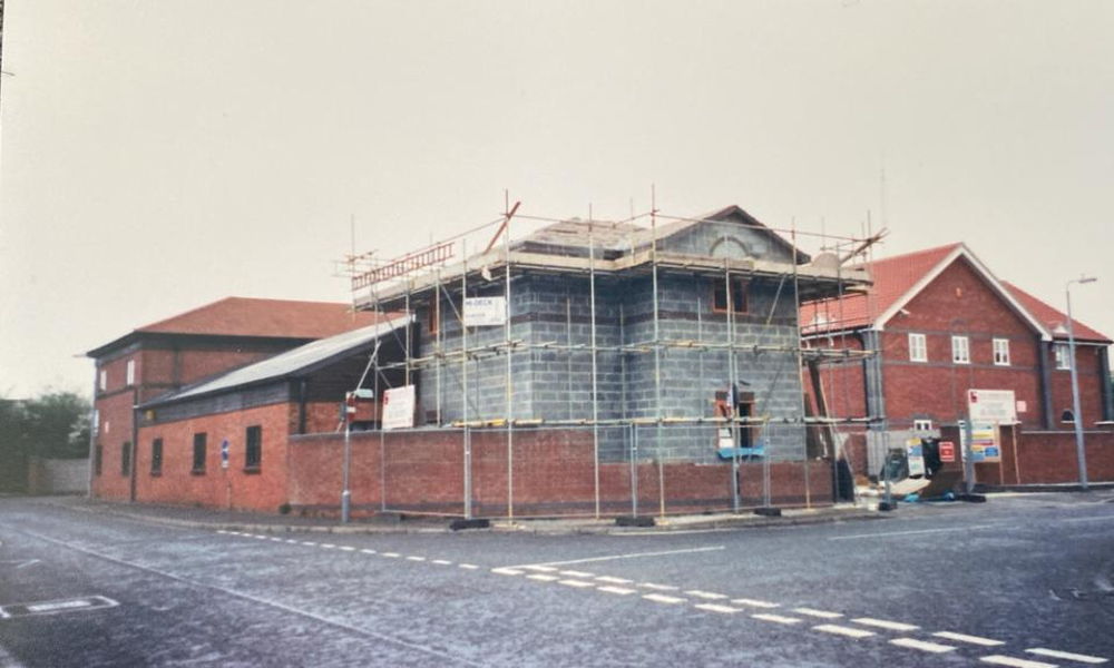 External view of the original factory under construction