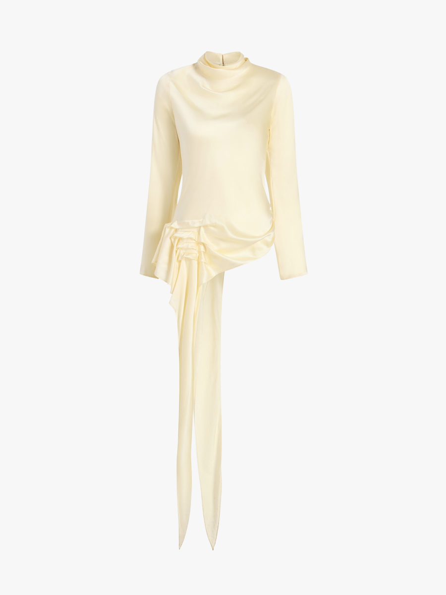 Cream colored Kallmeyer blouse.