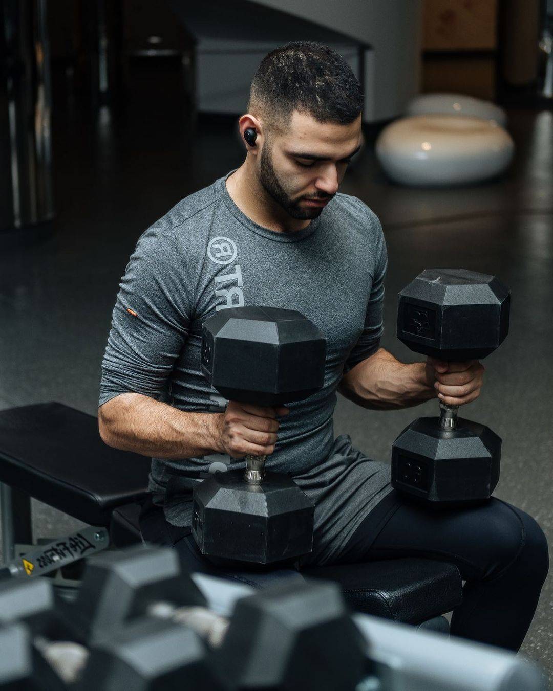 Man with Rubber Hex Dumbbells
