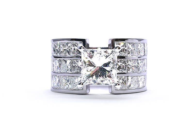 bague trois etages de diamants et diamant central