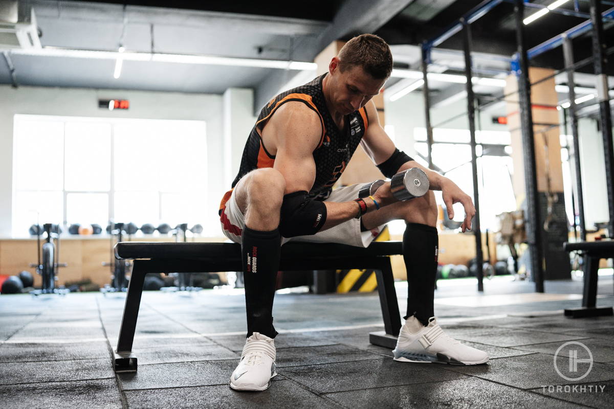 man workout on weighted bench man workout on weighted bench