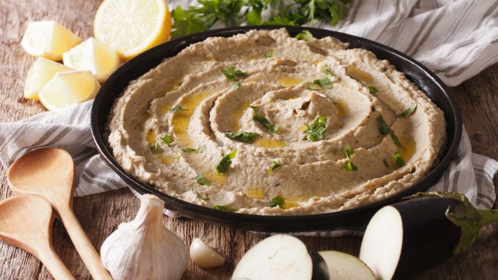 Baba Ghanoush, a smoky and creamy Levantine dip with roasted eggplant, tahini, olive oil, garlic, and lemon juice