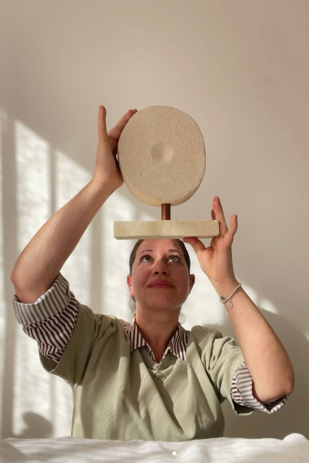Gilani Collection Sculpture Art by Evelyn Michaelides - Hand-carved, organic-shaped limestone sculpture art.