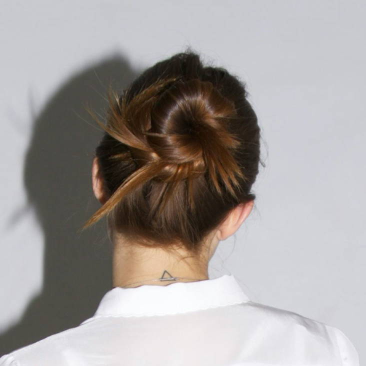 model with a tight bun
