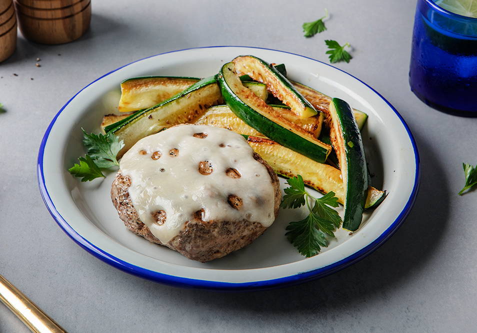 Grilled Organic Free-Range Turkey Burger with Swiss Cheese and Zucchini Spears