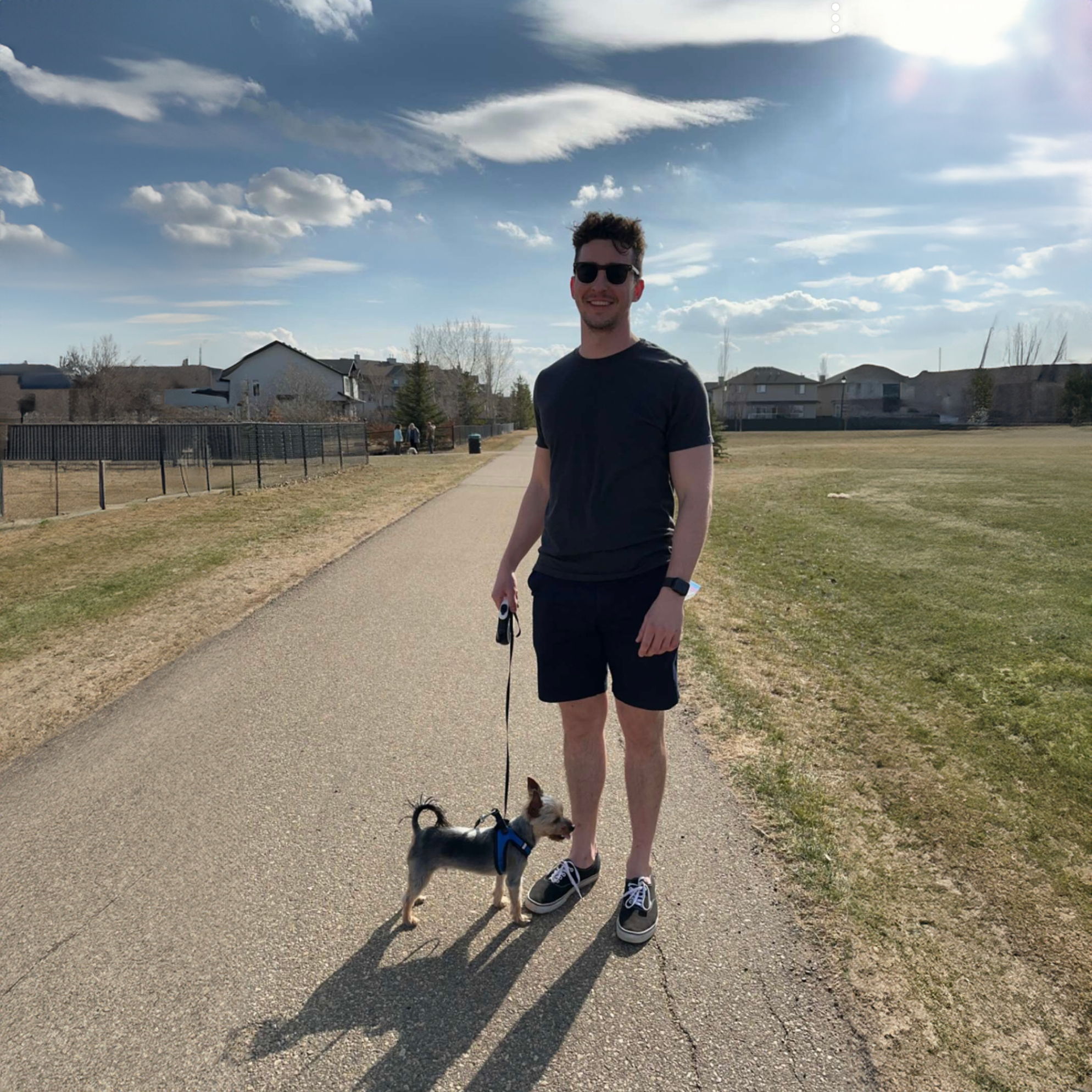 A picture of myself - Brian with my dog - Winston outside on a sunny day