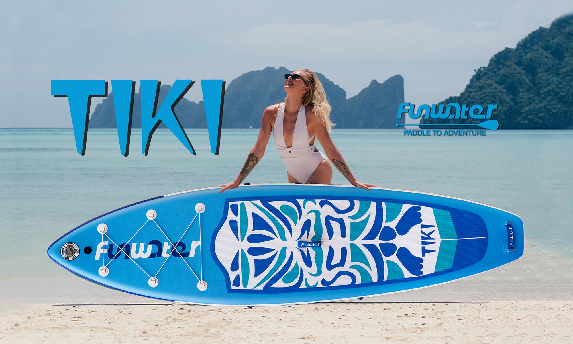 This woman is standing in front of the Funwater TIKI inflatable stand up paddle board