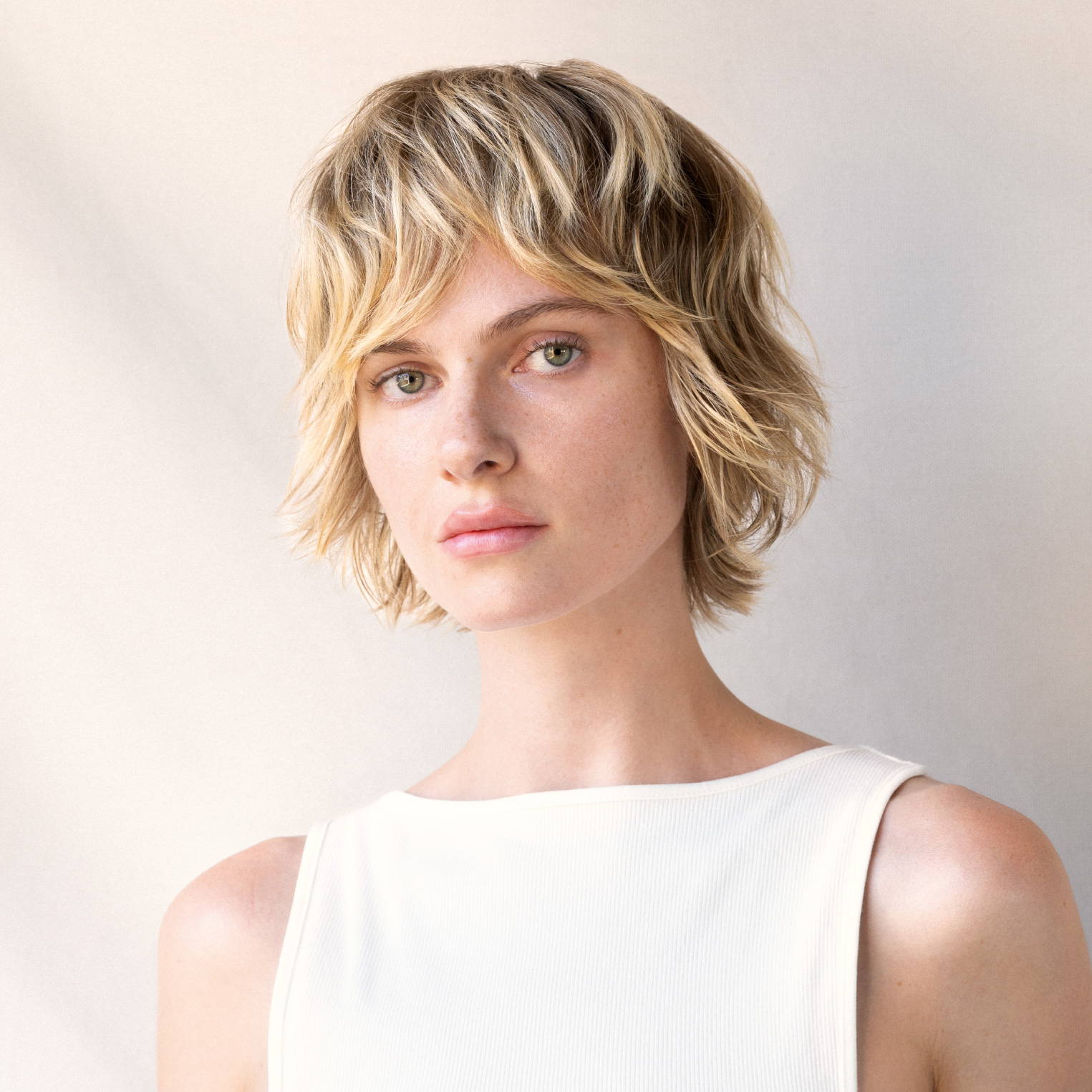 woman with short textured blonde hair