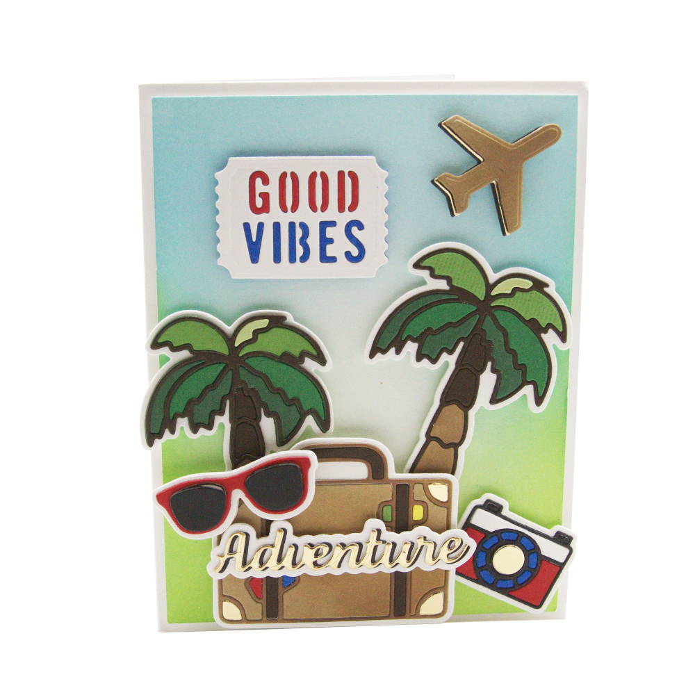 a hand made card with palm trees and summer travel themed icons covering the card