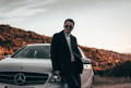 Mercedes luxury car motivation with guy