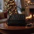 piper & skye anguilla lola crossbody handbag in a holiday decorated room