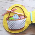 One of the Montessori Rabbit's Book pages showing felt eggs in a basket.