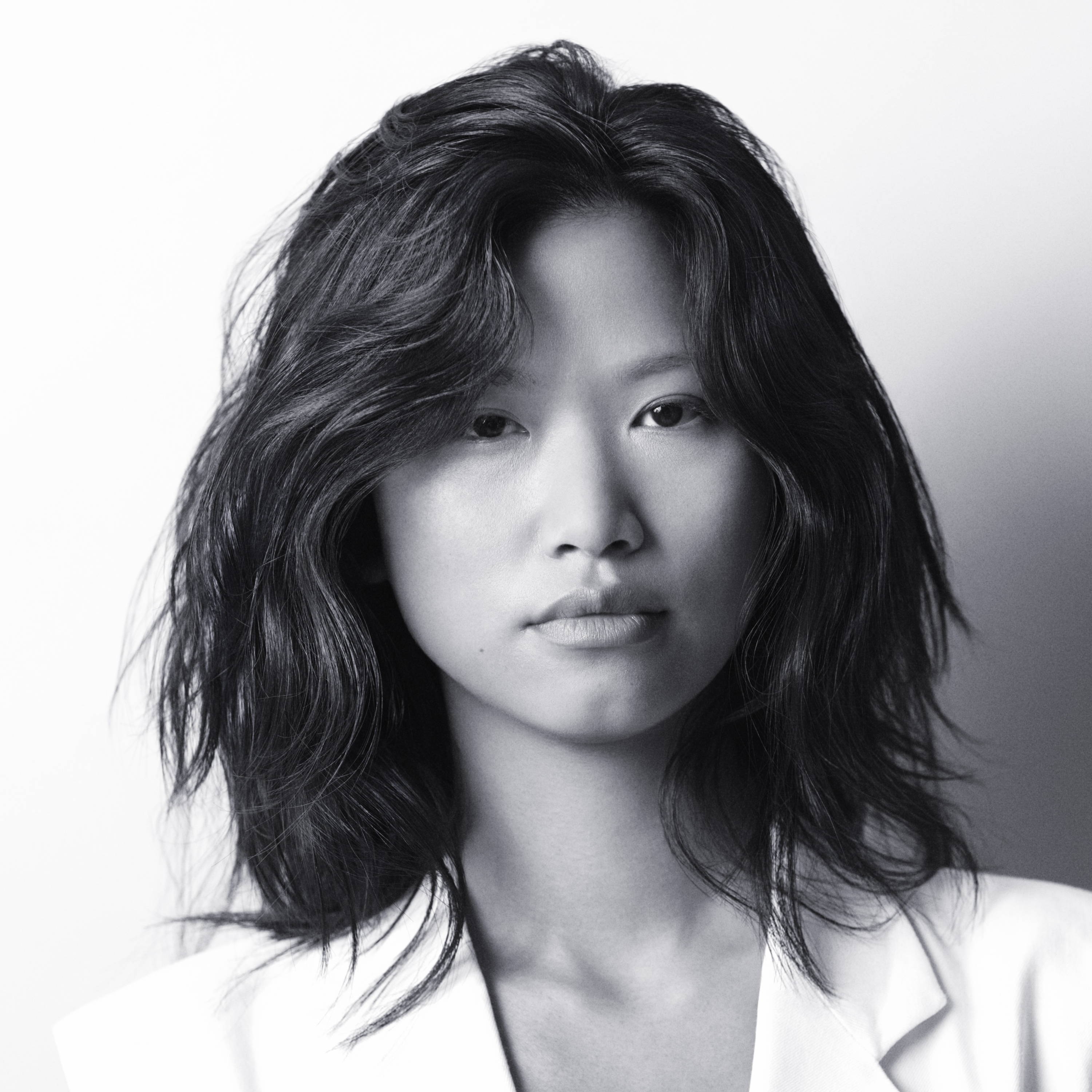 Woman with tousled, layered hair