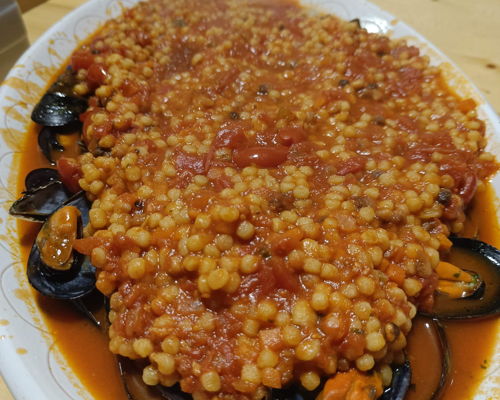 Cooking classes Cagliari: Fregola with Seafood: a journey through Sardinian flavors