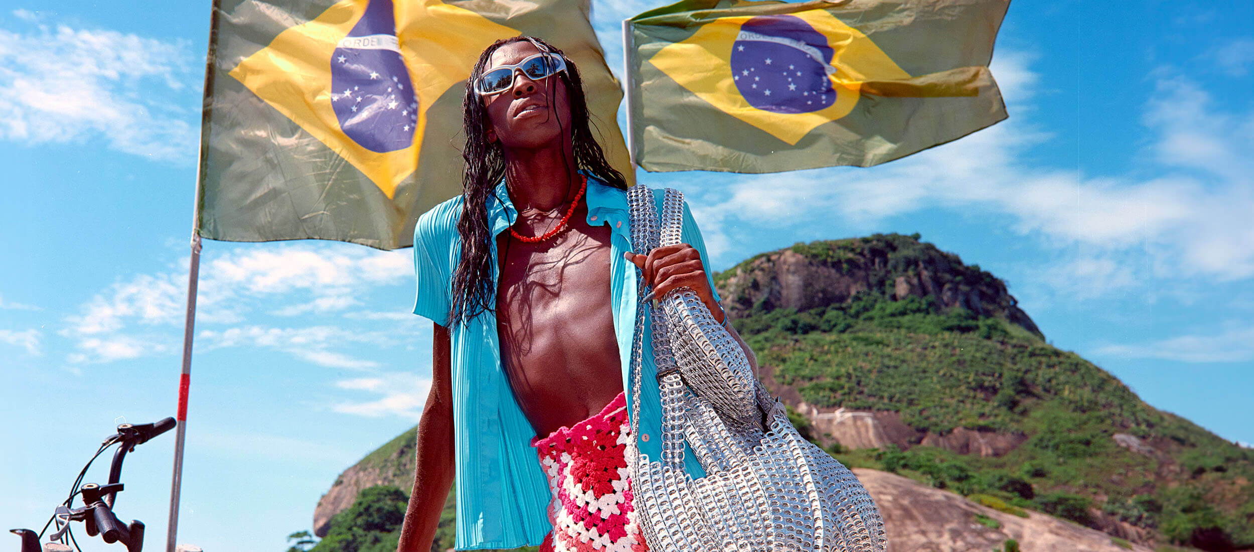 BOTTLETOP High Summer Campaign Image - featuring model wearing Silver Bellani Handbags