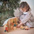 Close up on reindeer and Santa figurines featured in the Montessori Xmas Dollhouse set.