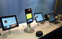 Fidelity shows off its "Office of the Future" featuring a remote-controlled iPad and a smart TV.  But can it core an Apple?