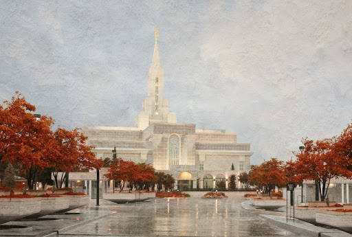 Bountiful Temple with fall trees after rainfall.