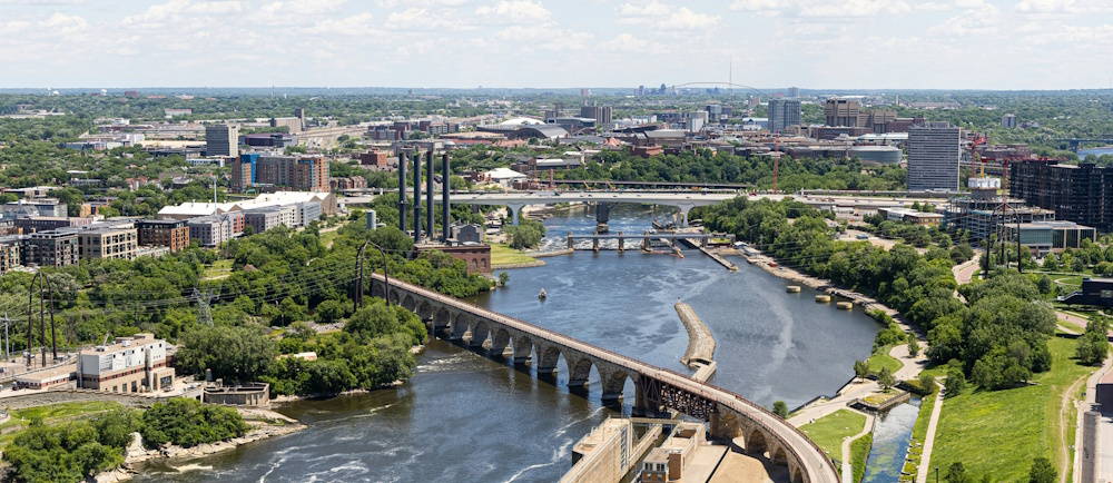 Aerial view of Minneapolis road system, parks, river and downtown