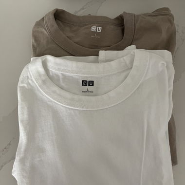 White and beige Uniqlo t-shirts both L