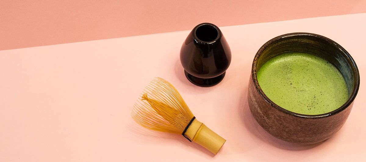 Matcha whisk care — bamboo chasen soaking in hot water