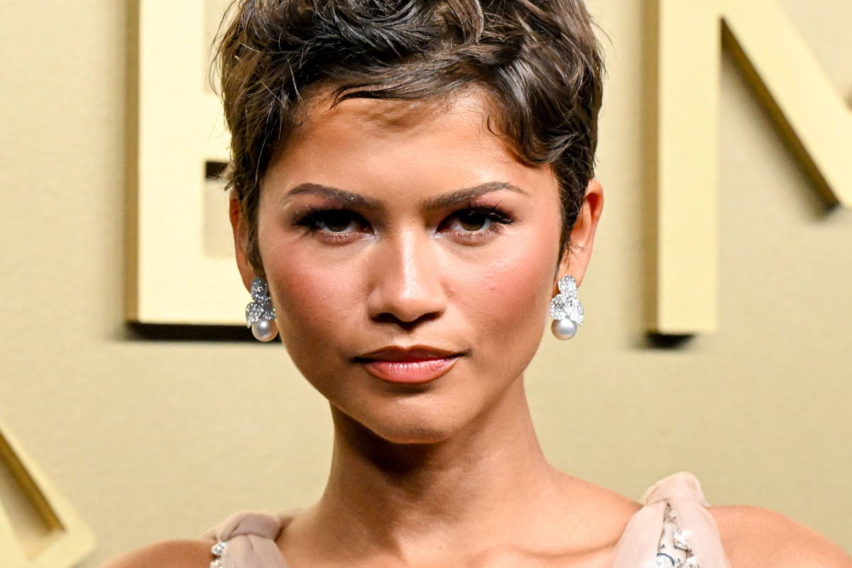 Image may contain: Zendaya, Face, Head, Person, Hair, Pixie Cut, Adult, and Wedding