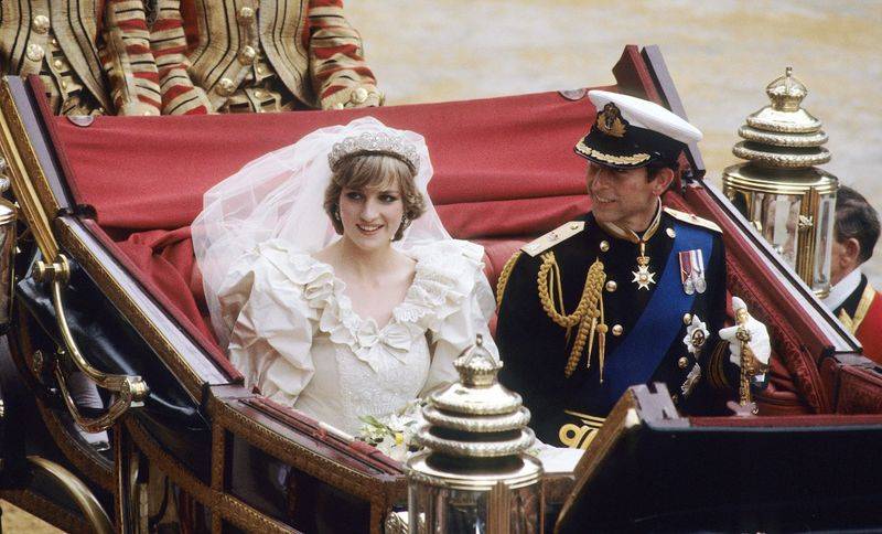 Image may contain: Diana, Princess of Wales, Charles, Prince of Wales, Person, Adult, Wedding, Face, Head, and Photography