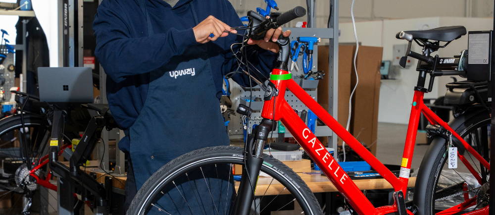 Upway mechanic servicing Gazelle electric bike