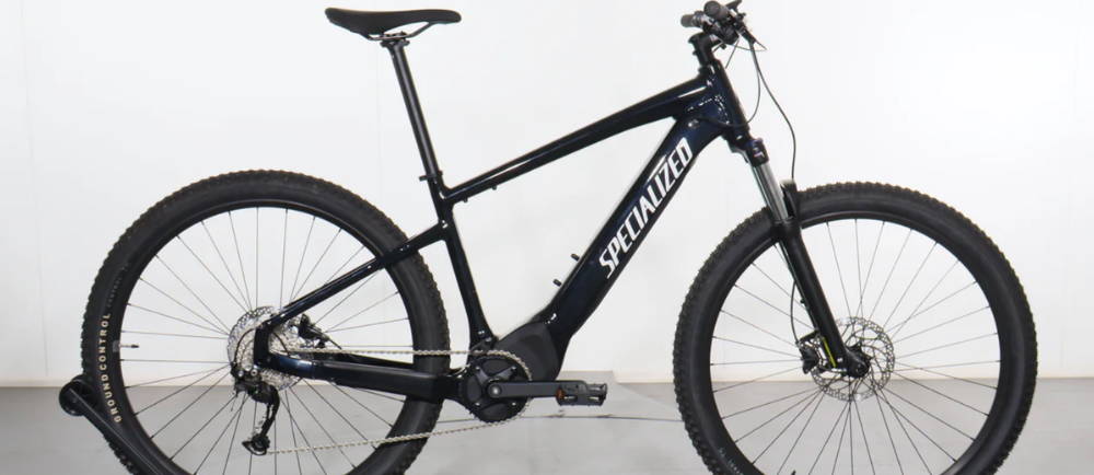 A black Specialized Turbo Tero 3.0 hardtail electric mountain bike
