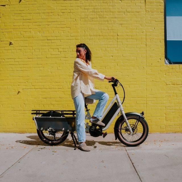 Female sittig on a cargo bike