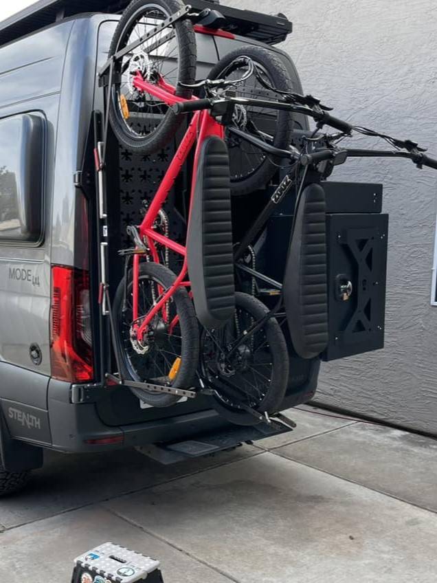 Storyteller Overland NVADER rack being used to carry two bikes.