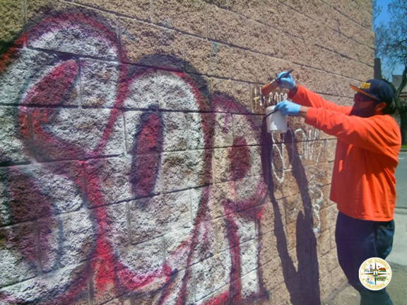 natural stone restored after being tagged with blue spray paint