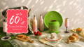 A display of spring-related products, like bird feeders and a hanging bird bath