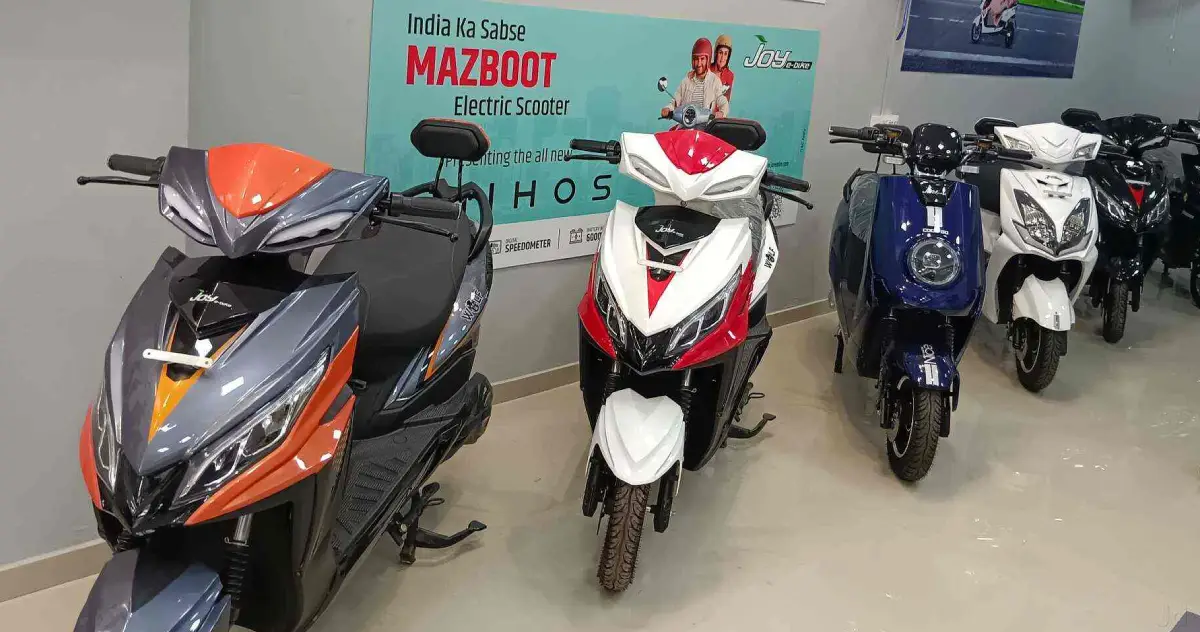 Interior of an electric scooter showroom with vehicles on display