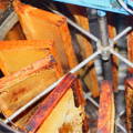 uncapped-honey-frames-in-honey-extractor