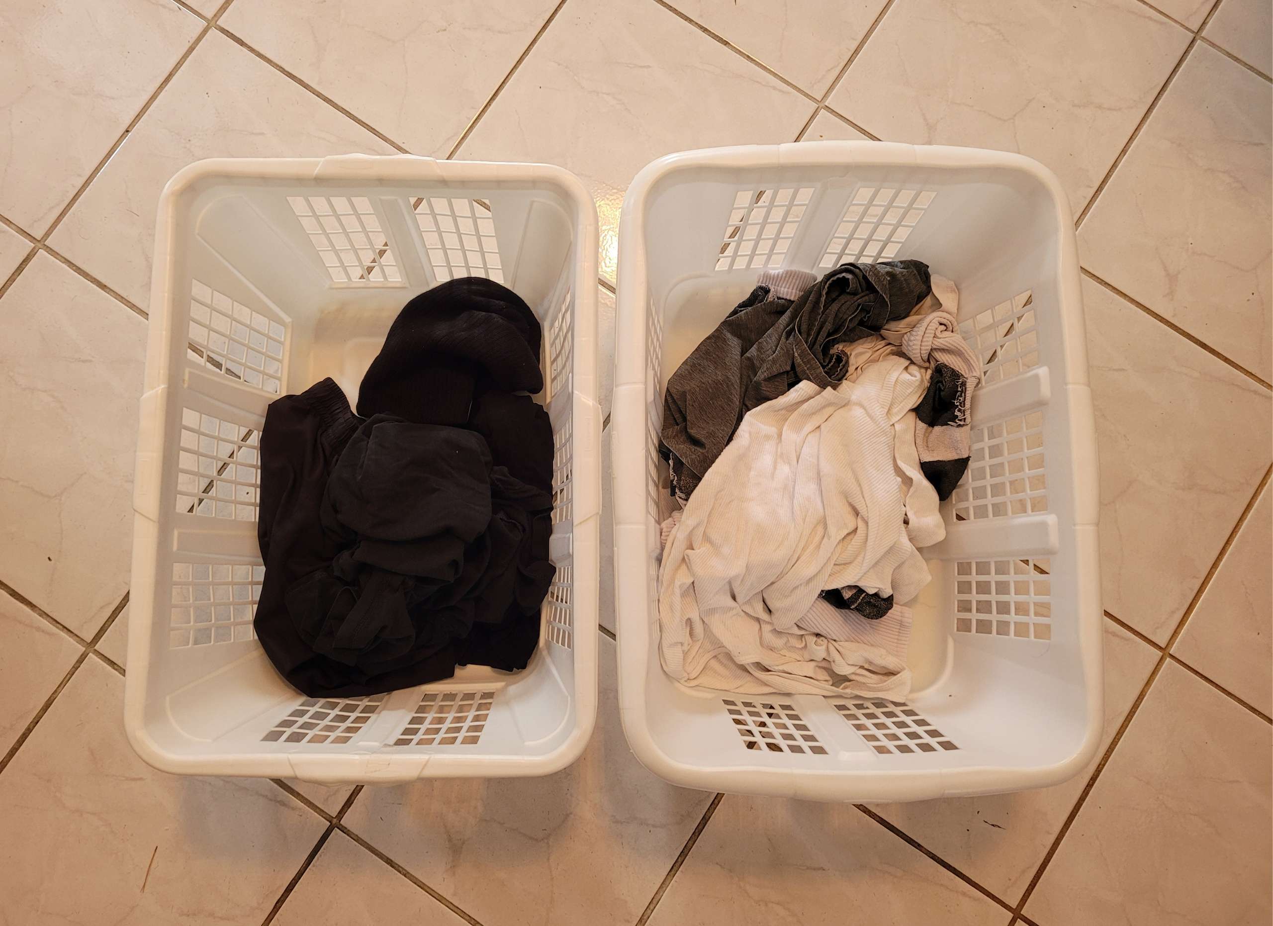 a photo of two laundry baskets side by side