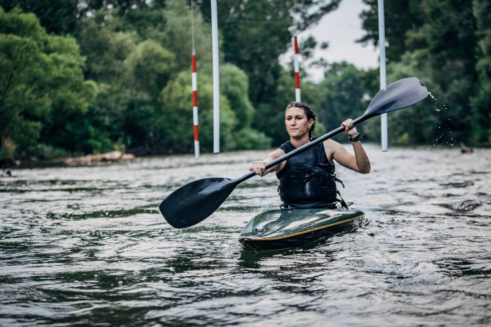Woman athlet training in kayaking Woman athlet training in kayaking