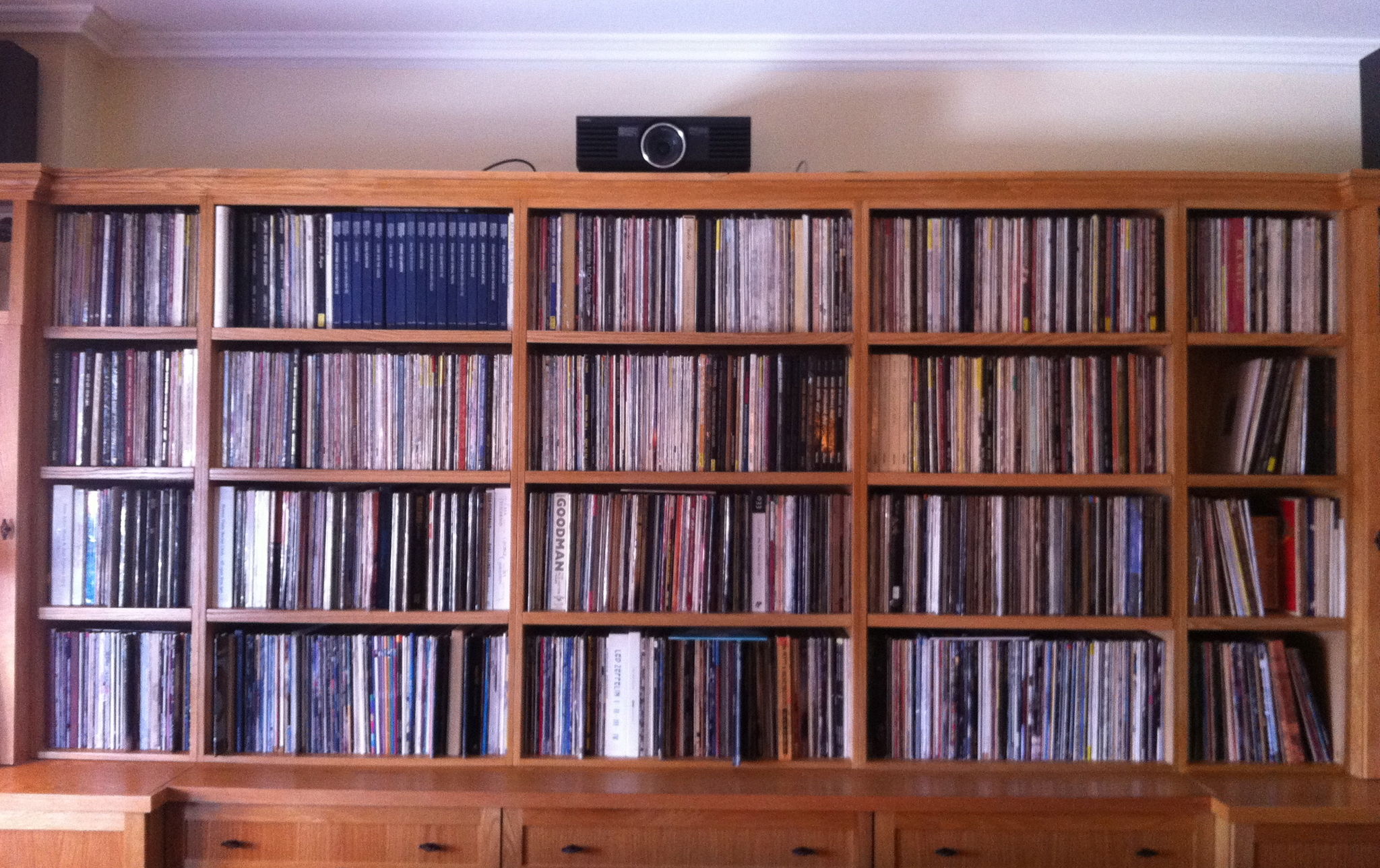 Wall of vinyl, with projector on top.